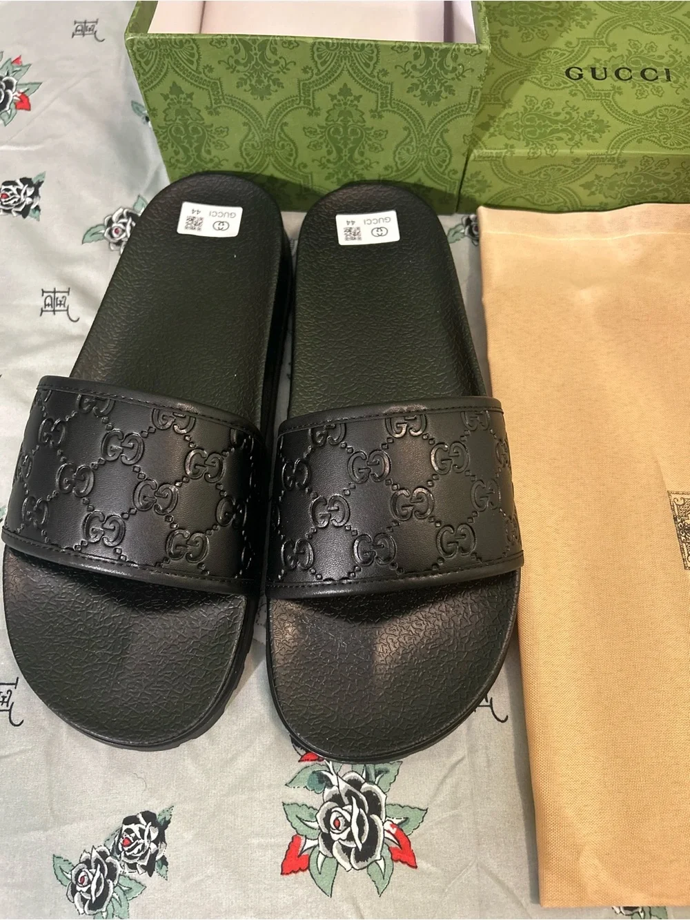 Gucci Black Embossed Logo Slide Sandals